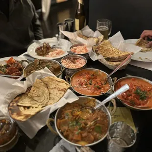 a table full of food and drinks