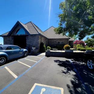 Tasting room in background with parking in foreground