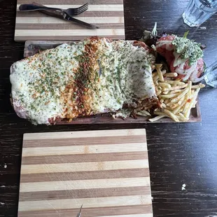 Beef Milanese Napolitana with fries &amp; salad.