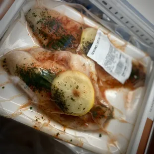 chicken wrapped in plastic