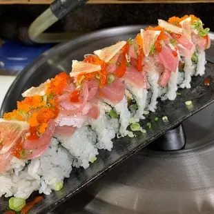 a sushi roll on a plate
