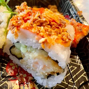 a close up of a plate of sushi