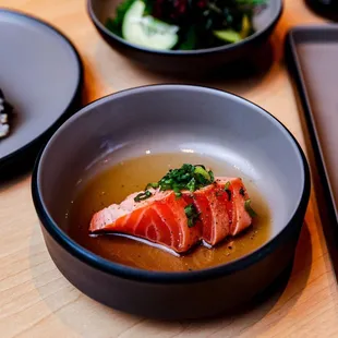Salmon Tataki Sashimi served with green onions and our own cracked black pepper ponzu sauce