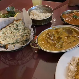 Basil Coconut Chicken, Lamb Tikka Masala, basil Garlic Naan.