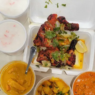 Chicken Tandoori, Butter Chicken, Aloo Gobi and Bhindi Masala