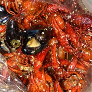 Crawfish and mussel cooked in his signature sauce