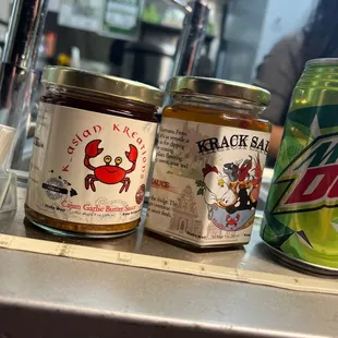 two cans of black bear and a can of mountain dew