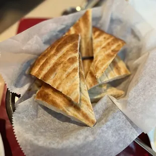 a basket of pita bread