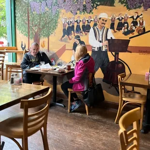two people sitting at a table