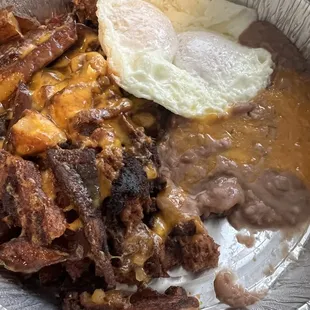 Breakfast papas con chorizo- asked for no egg- that's egg