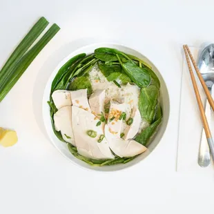a bowl of chicken and spinach