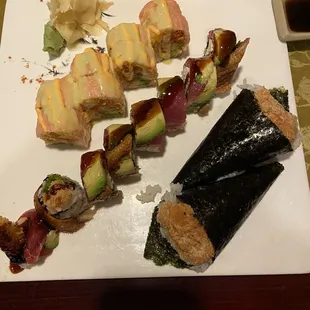 Happy Roll, Katana Roll and two spicy tuna hand rolls.