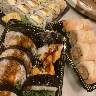 a variety of sushi and rolls