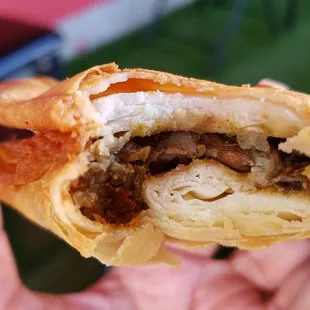 Interior of lentil sambusa ($1.50). Unusual thick shell. Dry lentil filling. Decent on a whole.