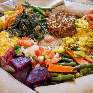 Veggie combo: potatoes, green beans (fosolia), beets, carrot, misir wot, alicha, collard greens, cabbage