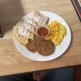 Turkey sausage patties, scrambled eggs, and waffles.