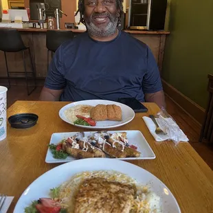 Katch the Kitchen Salmon and grits. Side of French toast.