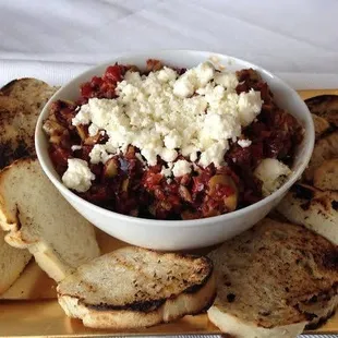 Olive Tapenade with Feta cheese and Grilled Multigrain crustinis