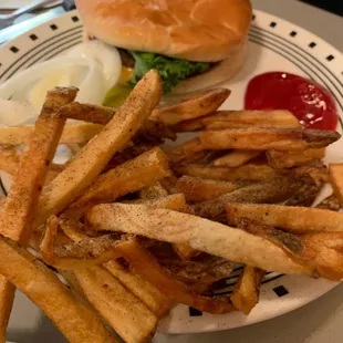 a plate of french fries and a burger