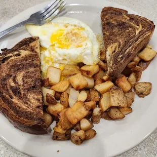 Eggs potatoes and rye toast