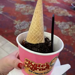 an ice cream cone in a cup