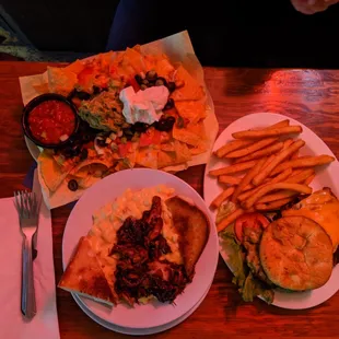 a plate of food and a plate of fries