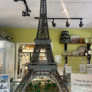 Lego Eiffel Tower on top of the glass showcase