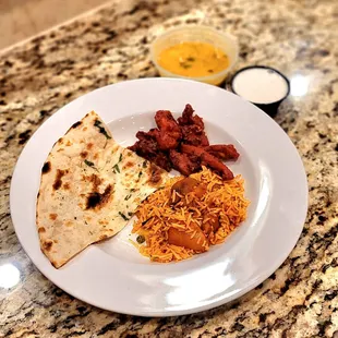 Chicken Biryani; Chicken 65; Garlic Naan