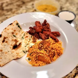 Chicken Biryani; Chicken 65; Garlic Naan