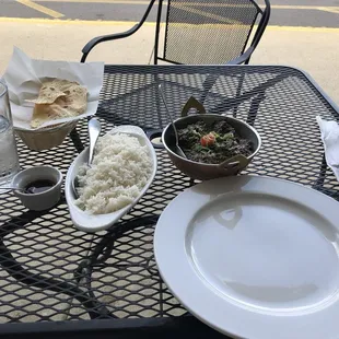 Lamb Saag, Gluten Free naan with a side of tamarind