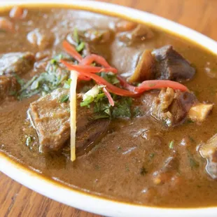 Khashi Ko Masu. Traditional Himalayan Goat Curry. Served with fresh basmati rice!
