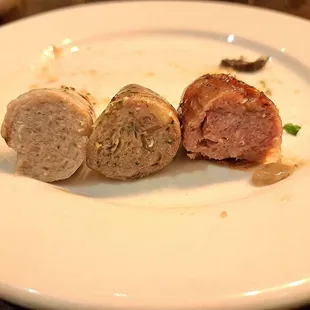 Inside sausages. I believe they are Bratwurst, House Special Sausage, and Chicken Apple.