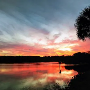 Amazing sunset by the fishing pond.