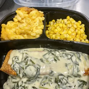 Salmon topped with cream spinach