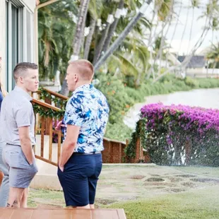 Guests hiding from sprinklers.