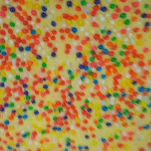 a closeup of a cake with sprinkles