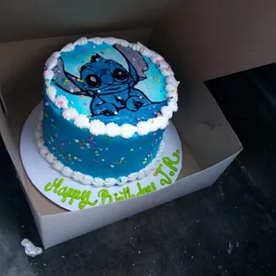 a blue cake with a stitching stitching stitching stitching stitching stitching stitching stitching stitch