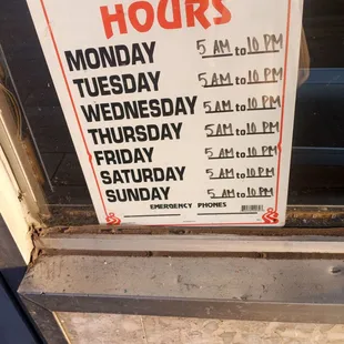 a business hours sign