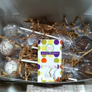 A dozen red velvet &amp; chocolate cake pops :)