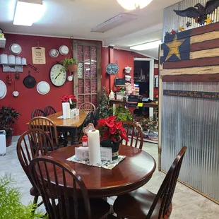 a dining room with a flag on the wall