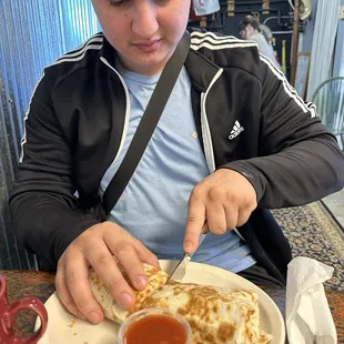 Build your own Breakfast Burrito, sausage, egg and cheese.