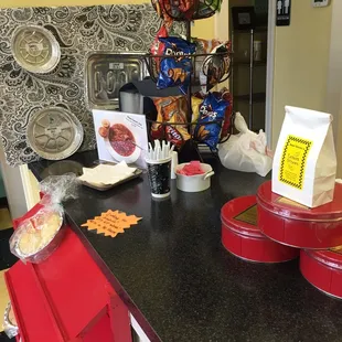 a counter with a variety of food items