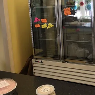 three pies in pie tins on a counter