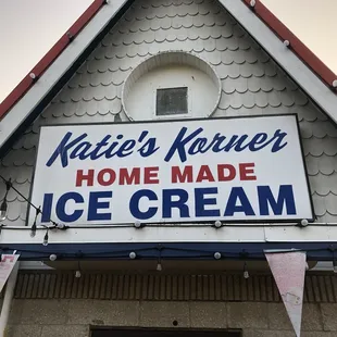 Signage in front of building.