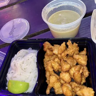 a tray of food on a picnic table