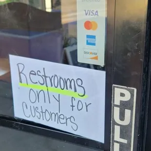 Sign on door restroom are for customers only.