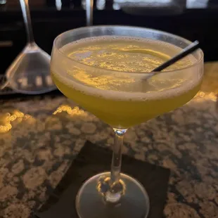 a cocktail in a coupe glass