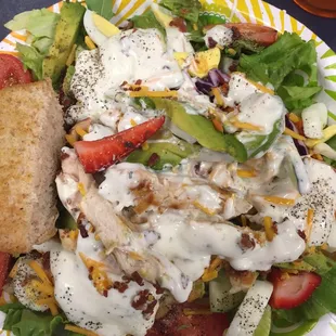 Grilled chicken salad, avocado, bacon, strawberries, and homemade ranch dressing - yum!!