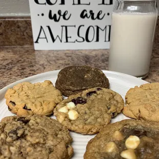 a plate of cookies and a glass of milk