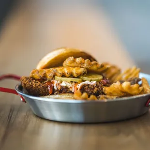 a burger and fries on a plate